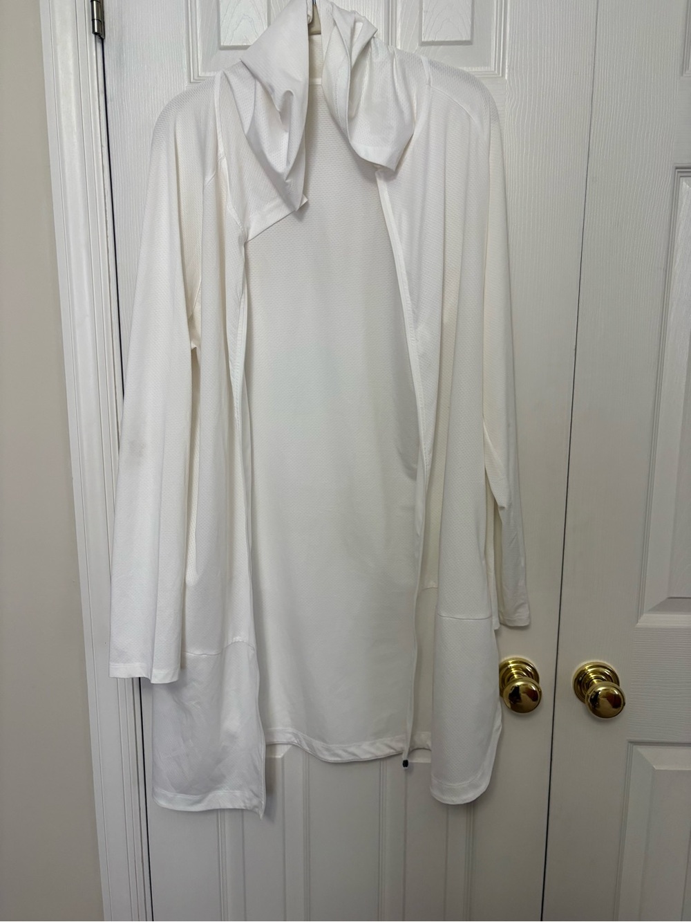 White hooded zippered long sleeve swim cover up